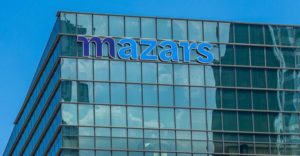 Mazars Suspende las Auditorías de Binance, KuCoin y Crypto.com