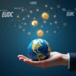 Mano corporativa transfiriendo tokens digitales al globo a través de Visa Direct, logotipos USDC y EURC visibles, liquidación instantánea
