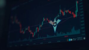 Primer plano de mesa de trading cripto con logo de Stellar y gráfico de caída del 7,7% por debajo de 0,28$, con volumen alto.