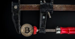 Image shows that Bitcoin's prices are within predictions and measurements.