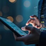 Financial analyst looking at a tablet with a digital payments and cryptocurrencies dashboard, urban background and blockchain symbols.