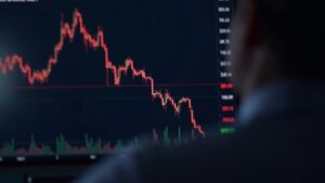 Crypto trader analyzes Solana chart with two bearish crossovers and SOL logo on screen