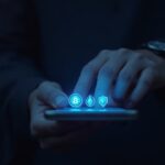 Photo-realistic close-up of a smartphone displaying a multi-chain wallet with BTC, ETH and SOL icons glowing.
