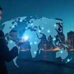 Photorealistic executive in a suit with a holographic map of AI, biotech and defense icons over a modern city skyline.