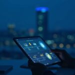 Analyst in a newsroom holds a tablet displaying BTC, ETH and SOL icons with Nasdaq Stockholm building lit blue in background.